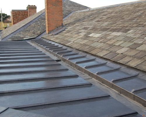 Leadwork for flat roofs